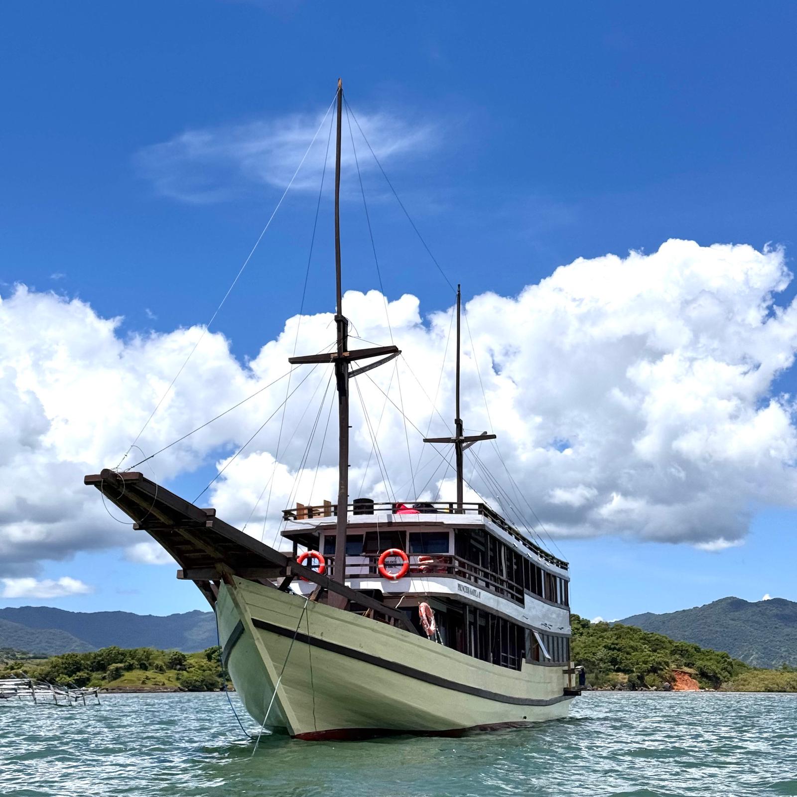 Princess Nabila at anchor with two masts and long bowsprit