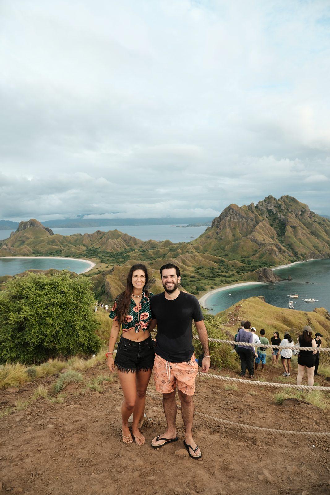 Padar – Couple posing, Padar bays, crowd on ridge (Taken on a real Komodo Explorer trip)