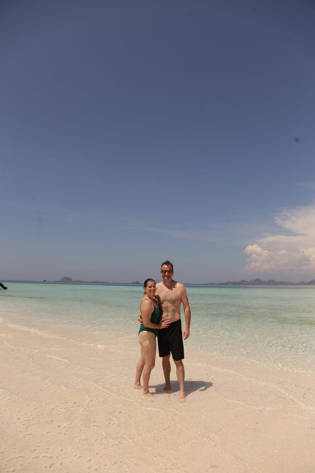 Taka Makassar – couple on sandbar, clear shallows (Taken on a real Komodo Explorer trip)