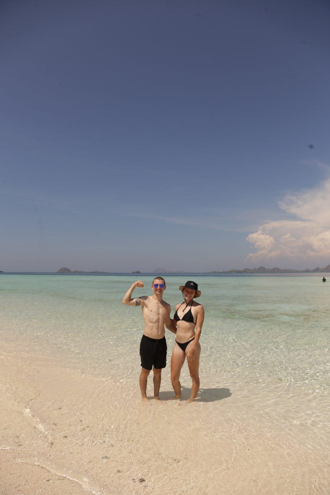 Taka Makassar – couple on sandbar, shirtless man (Taken on a real Komodo Explorer trip)